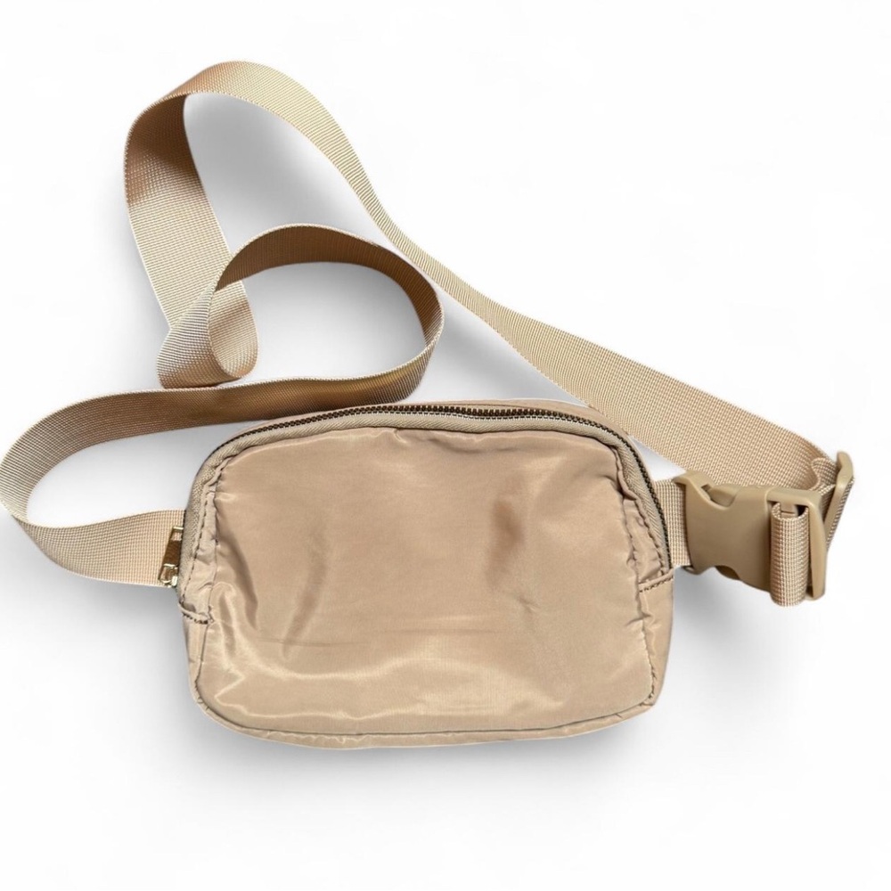 LIGHT TAN belt bag/crossbody. Black interior. Like NEW!